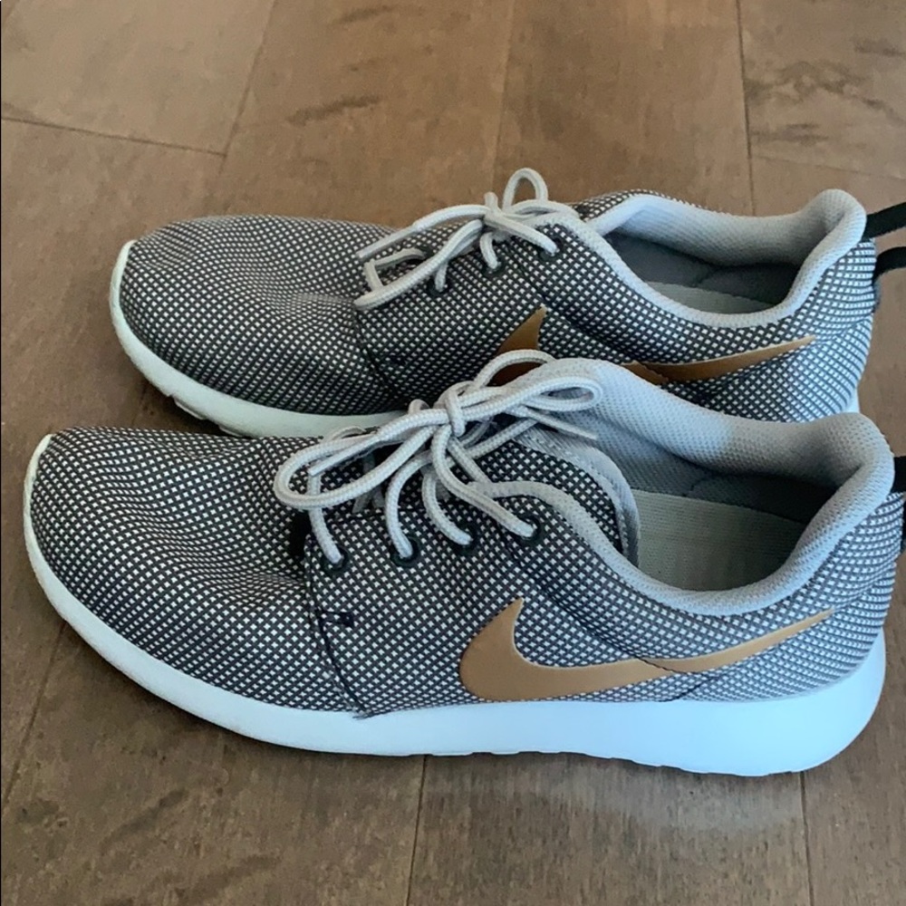 Nike gray and gold sneakers